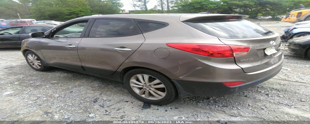 KM8JU3AC6CU344573 2012 HYUNDAI TUCSON photo no. 3
