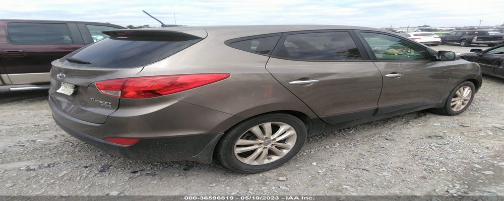 KM8JU3AC6CU344573 2012 HYUNDAI TUCSON photo no. 4