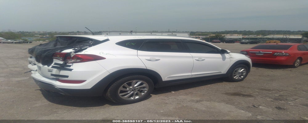 KM8J3CA25GU074686 2016 HYUNDAI TUCSON photo no. 4