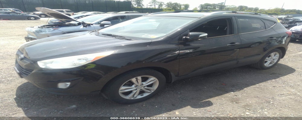 KM8JUCAC5DU565499 2013 HYUNDAI TUCSON photo no. 2