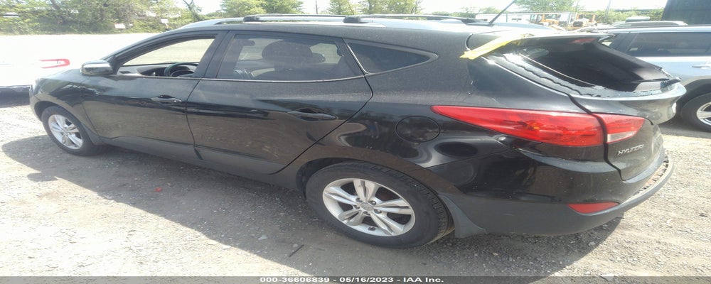 KM8JUCAC5DU565499 2013 HYUNDAI TUCSON photo no. 3