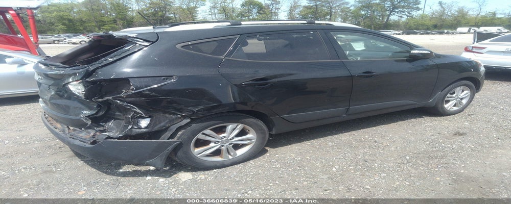 KM8JUCAC5DU565499 2013 HYUNDAI TUCSON photo no. 4