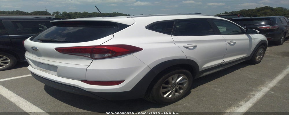 KM8J33A47HU432888 2017 HYUNDAI TUCSON photo no. 4