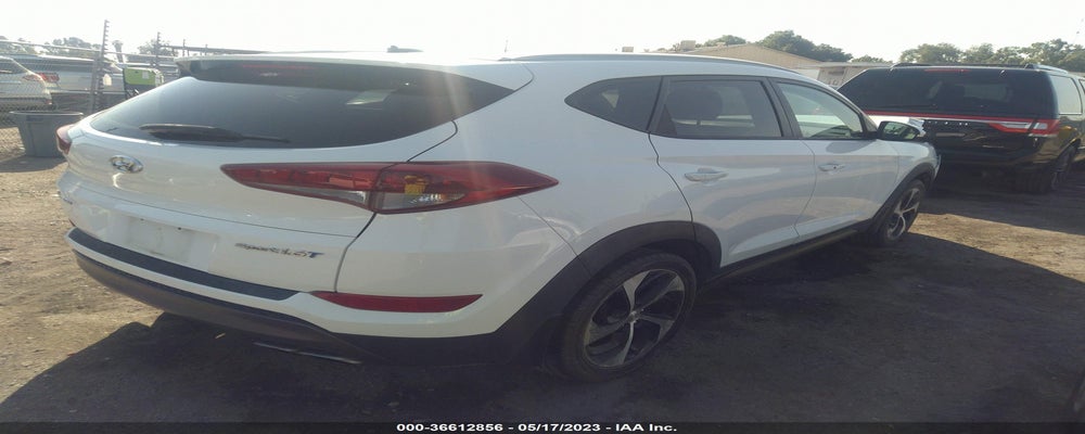 KM8J33A21GU065435 2016 HYUNDAI TUCSON photo no. 4