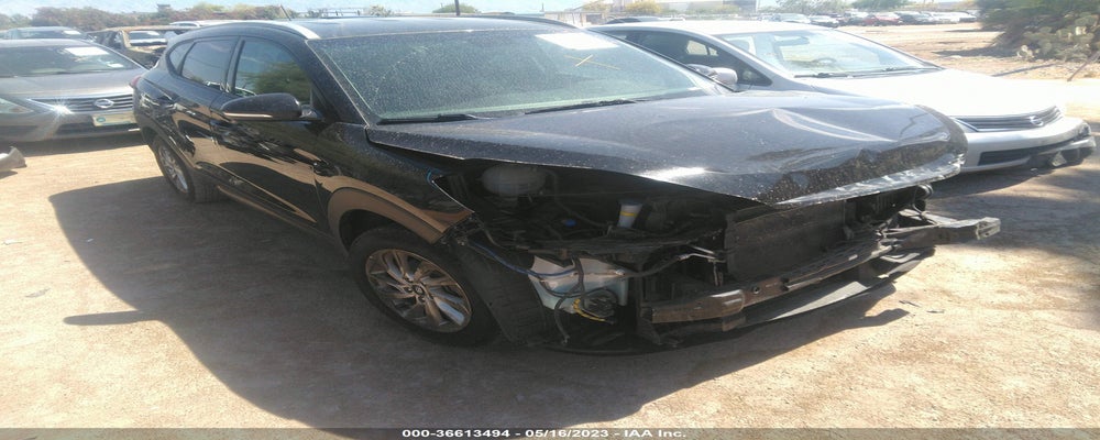 KM8J3CA25GU129296 2016 HYUNDAI TUCSON photo no. 16