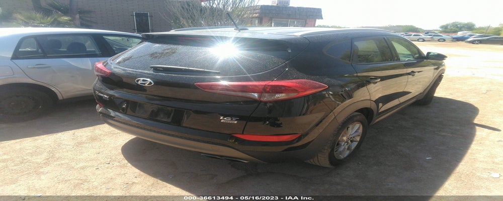 KM8J3CA25GU129296 2016 HYUNDAI TUCSON photo no. 4