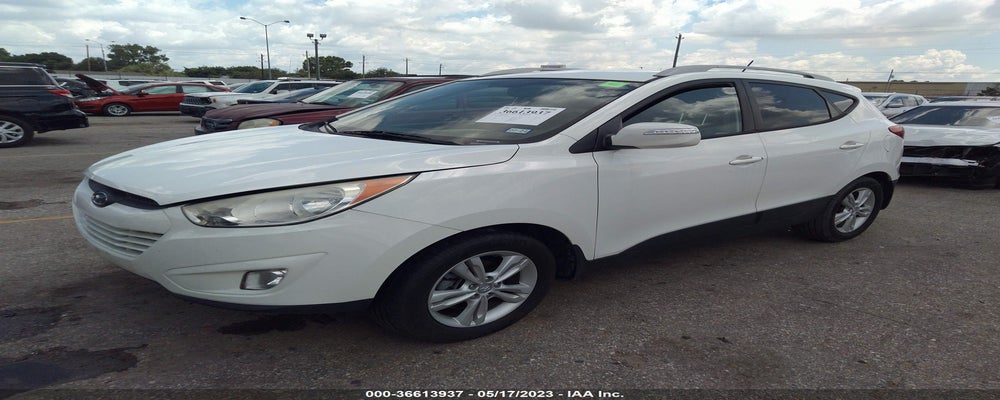 KM8JU3AC6DU591805 2013 HYUNDAI TUCSON photo no. 2