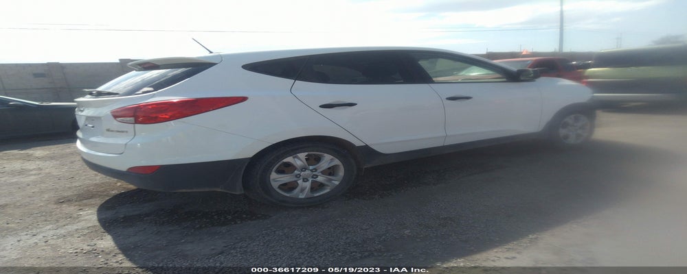 KM8JT3AB8DU712411 2013 HYUNDAI TUCSON photo no. 4