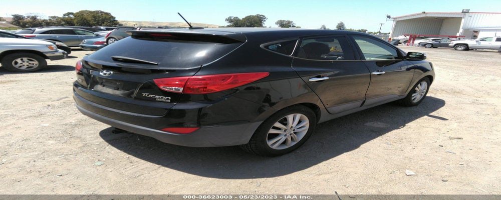 KM8JU3AC7CU361589 2012 HYUNDAI TUCSON photo no. 4