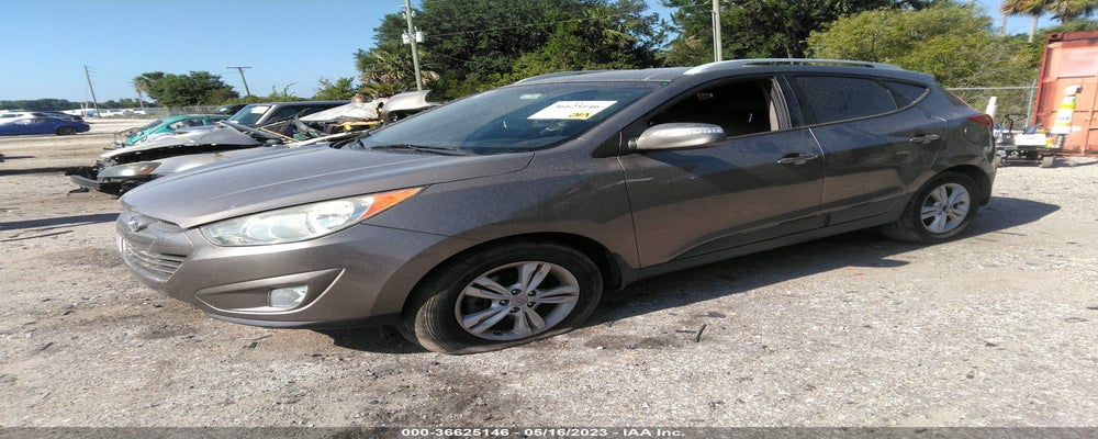 KM8JU3AC8DU573757 2013 HYUNDAI TUCSON photo no. 2