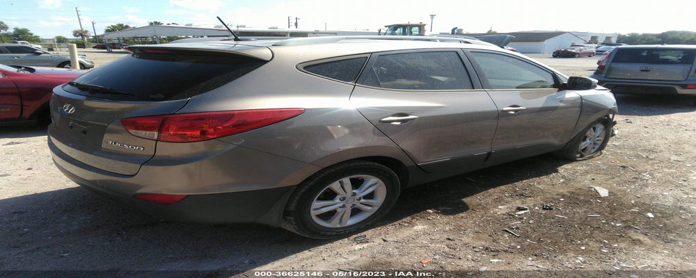 KM8JU3AC8DU573757 2013 HYUNDAI TUCSON photo no. 4