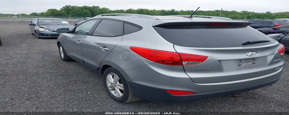 KM8JUCAC2CU380311 2012 HYUNDAI TUCSON photo no. 3