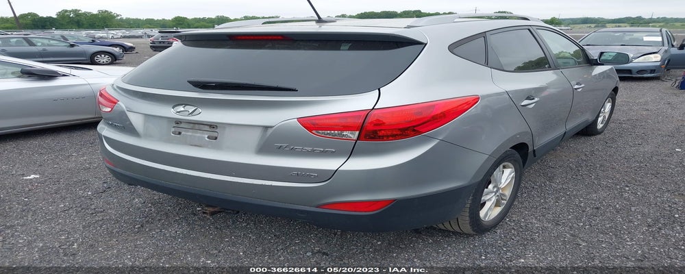 KM8JUCAC2CU380311 2012 HYUNDAI TUCSON photo no. 4