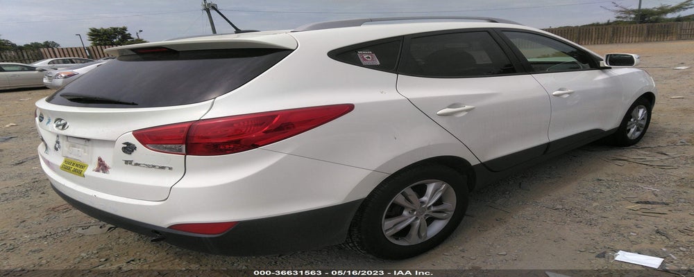 KM8JU3AC3DU548331 2013 HYUNDAI TUCSON photo no. 4