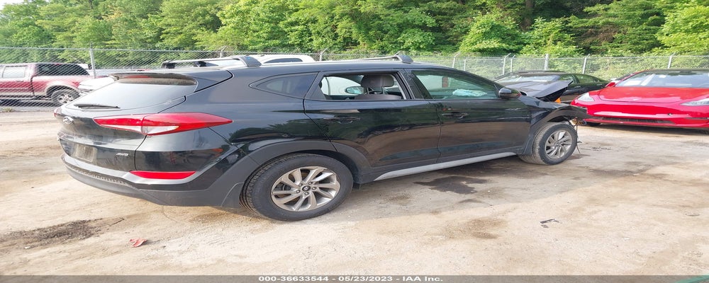 KM8J3CA47JU799702 2018 HYUNDAI TUCSON photo no. 4