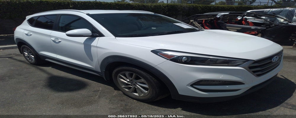 KM8J33A49HU511463 2017 HYUNDAI TUCSON photo no. 4