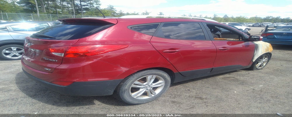 KM8JUCAC9CU456459 2012 HYUNDAI TUCSON photo no. 4