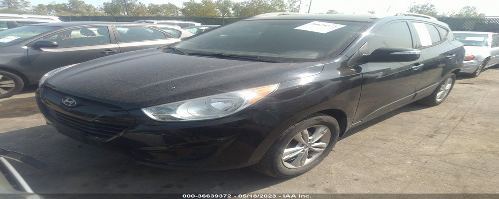 KM8JU3AC8CU434078 2012 HYUNDAI TUCSON photo no. 2