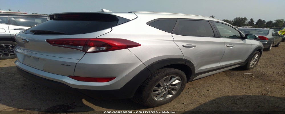 KM8J3CA43JU730666 2018 HYUNDAI TUCSON photo no. 4