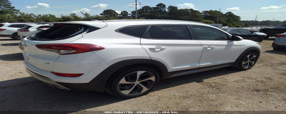 KM8J33A23HU340434 2017 HYUNDAI TUCSON photo no. 4