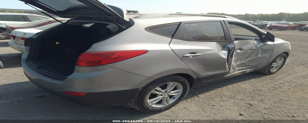 KM8JU3AC8BU171251 2011 HYUNDAI TUCSON photo no. 4