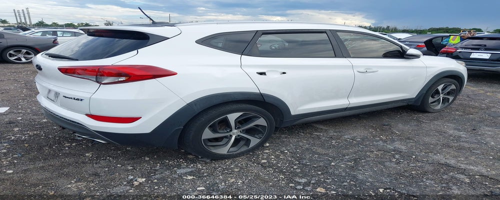 KM8J33A28GU257404 2016 HYUNDAI TUCSON photo no. 4