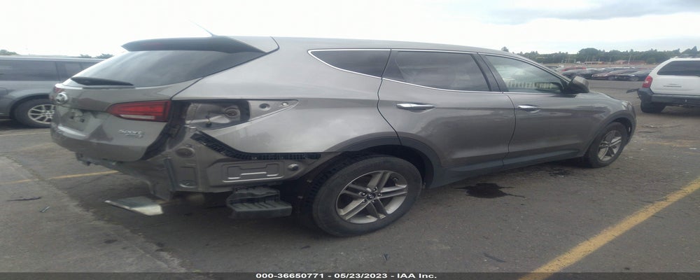 5NMZTDLB5JH090458 2018 HYUNDAI SANTA FE SPORT photo no. 4