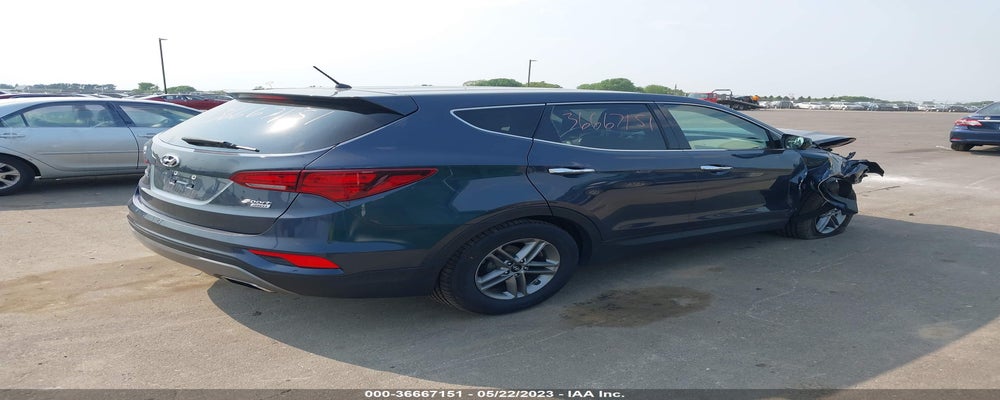 5NMZTDLB6JH082076 2018 HYUNDAI SANTA FE SPORT photo no. 4