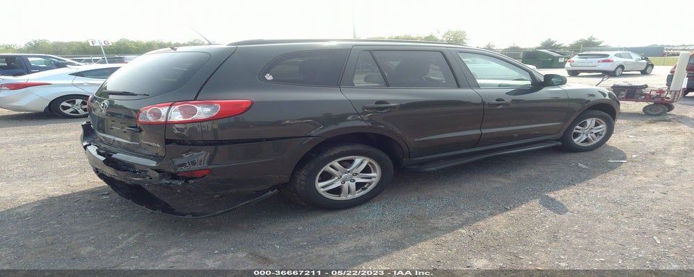 5NMSG3AB9AH390281 2010 HYUNDAI SANTA FE photo no. 4