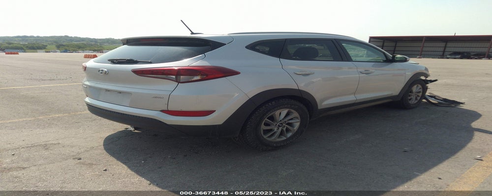 KM8J3CA44GU075491 2016 HYUNDAI TUCSON photo no. 4
