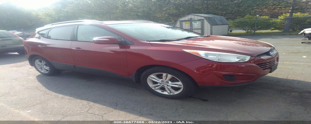 KM8JUCAC2CU384892 2012 HYUNDAI TUCSON photo no. 1