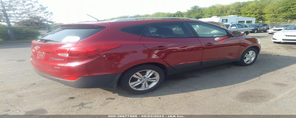 KM8JUCAC2CU384892 2012 HYUNDAI TUCSON photo no. 4