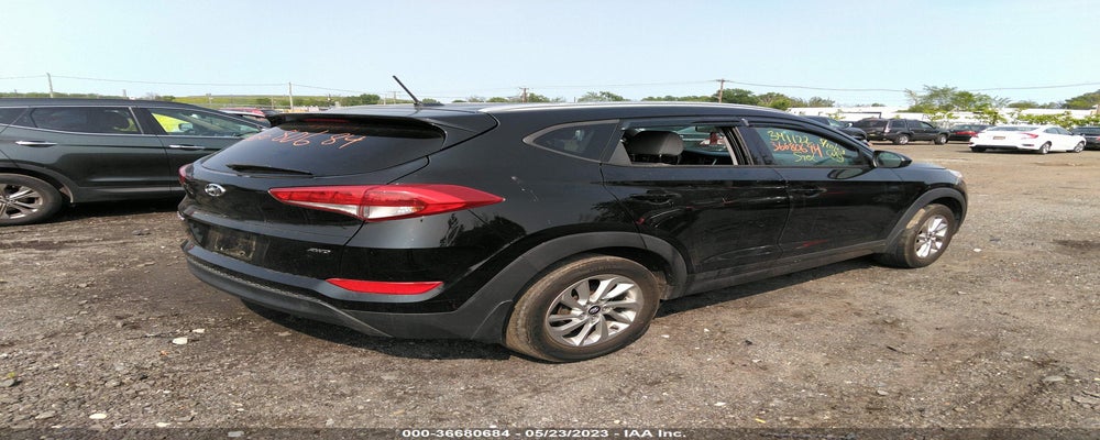KM8J3CA42GU040495 2016 HYUNDAI TUCSON photo no. 4