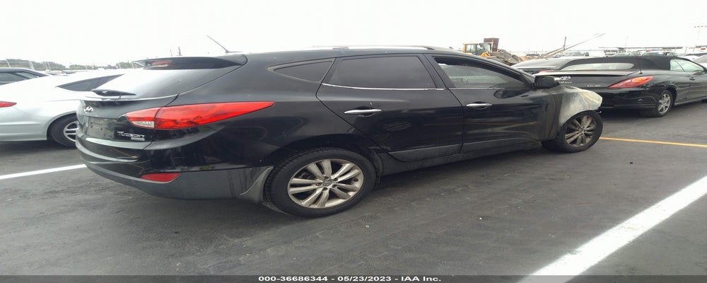 KM8JU3AC0CU512885 2012 HYUNDAI TUCSON photo no. 4
