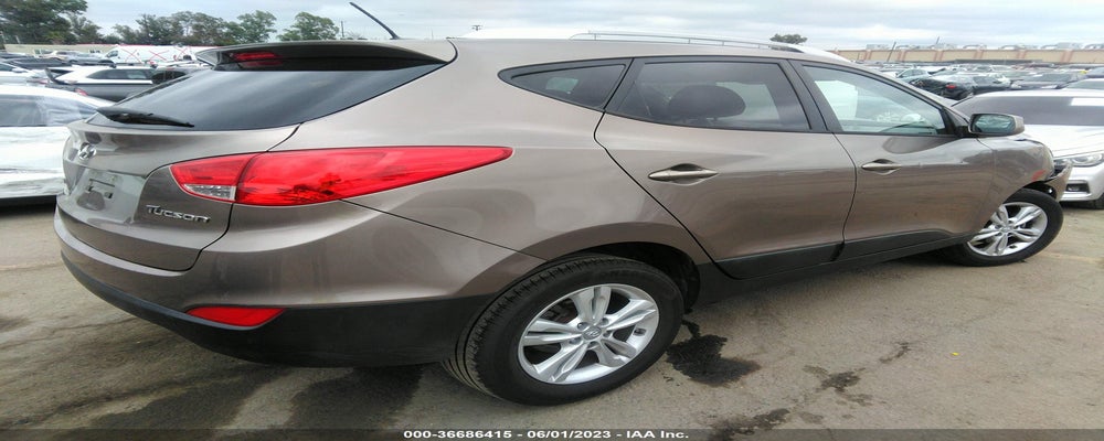 KM8JU3AC1BU276438 2011 HYUNDAI TUCSON photo no. 4