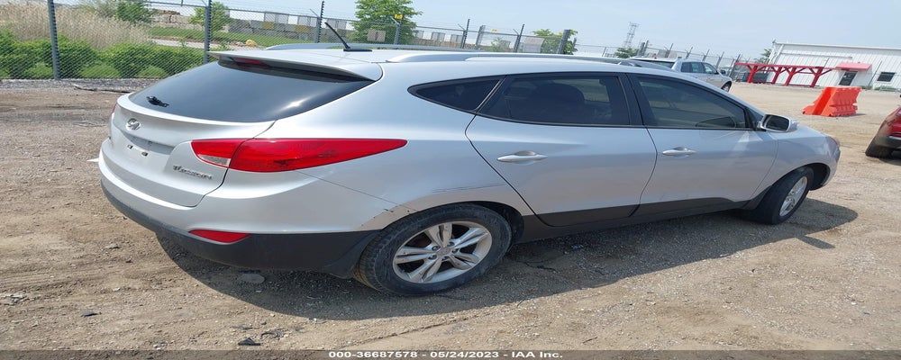 KM8JU3AC6CU502927 2012 HYUNDAI TUCSON photo no. 4