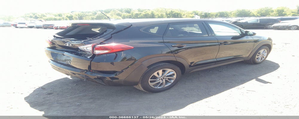 KM8J23A42GU168724 2016 HYUNDAI TUCSON photo no. 4