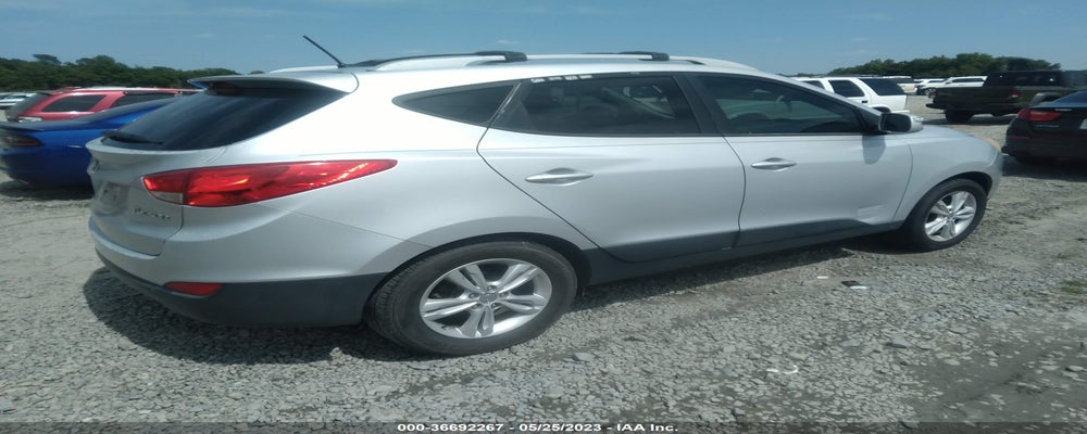 KM8JU3AC0CU443759 2012 HYUNDAI TUCSON photo no. 4