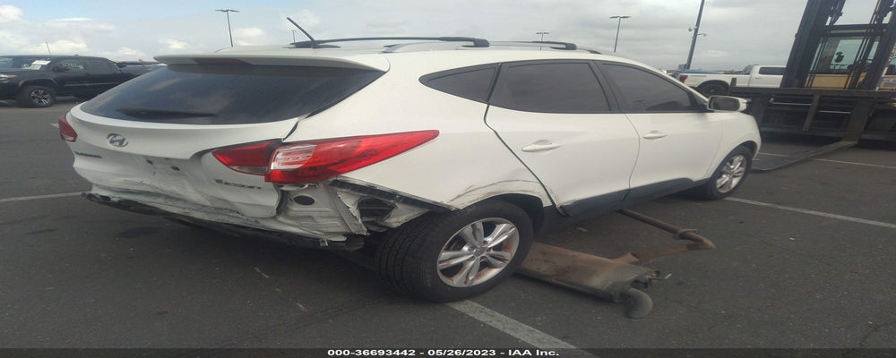 KM8JU3AC9CU433490 2012 HYUNDAI TUCSON photo no. 4