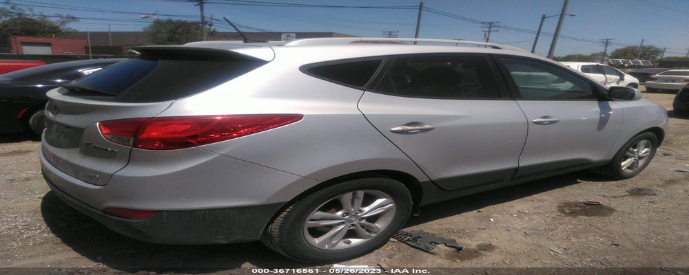 KM8JUCAC5AU022844 2010 HYUNDAI TUCSON photo no. 4