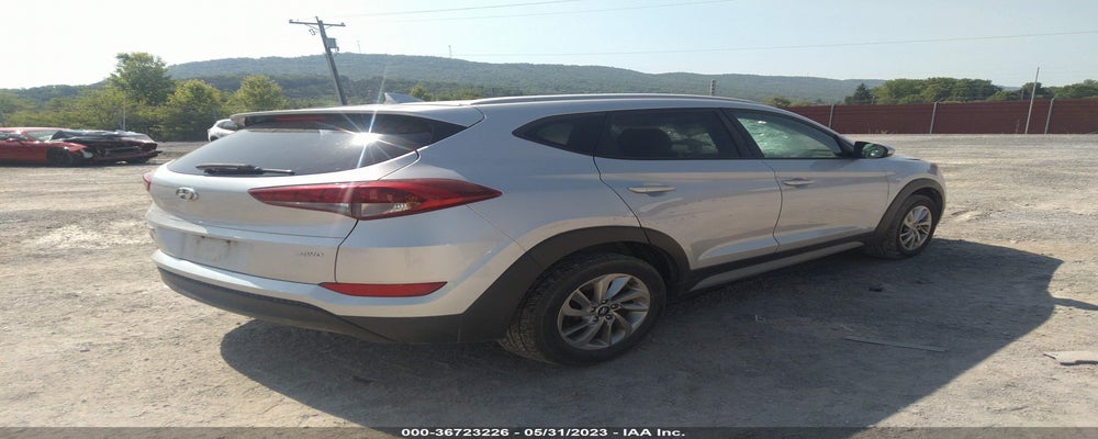 KM8J3CA48JU693260 2018 HYUNDAI TUCSON photo no. 4