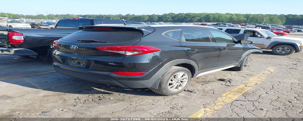 KM8J3CA4XHU588228 2017 HYUNDAI TUCSON photo no. 4