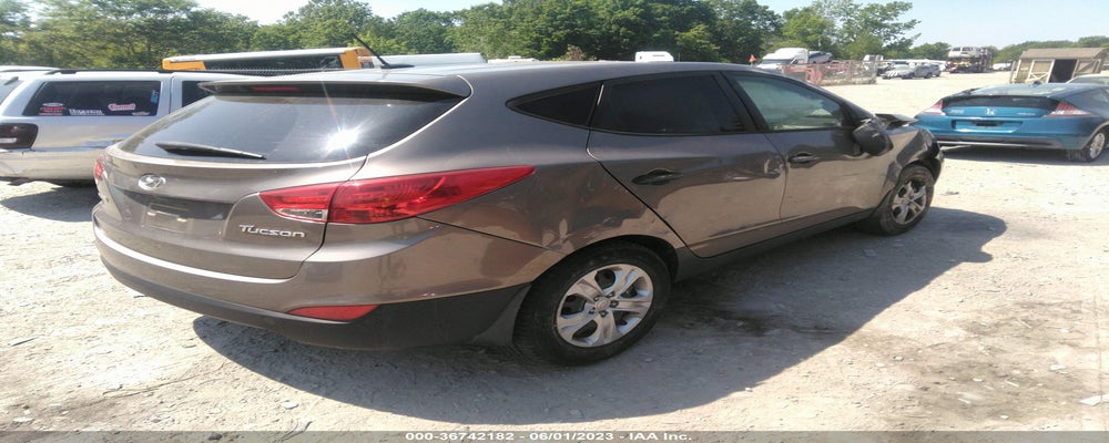 KM8JT3AB5CU338869 2012 HYUNDAI TUCSON photo no. 4