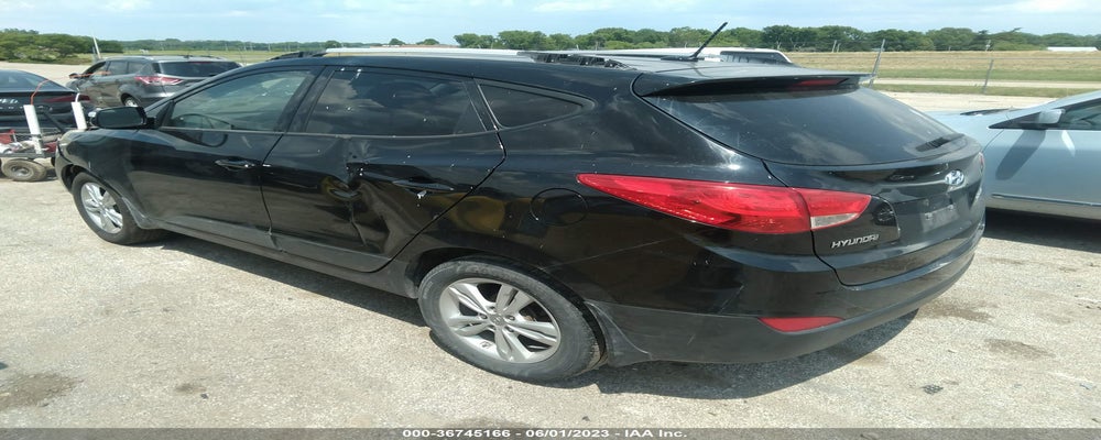 KM8JU3AC4CU497968 2012 HYUNDAI TUCSON photo no. 3