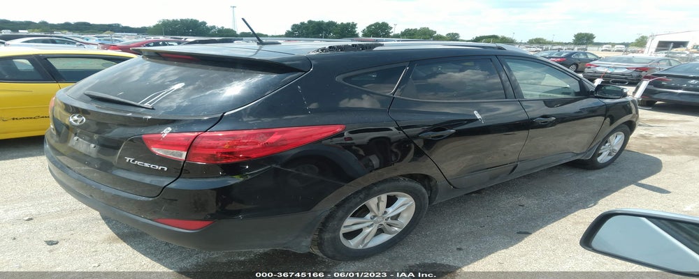 KM8JU3AC4CU497968 2012 HYUNDAI TUCSON photo no. 4