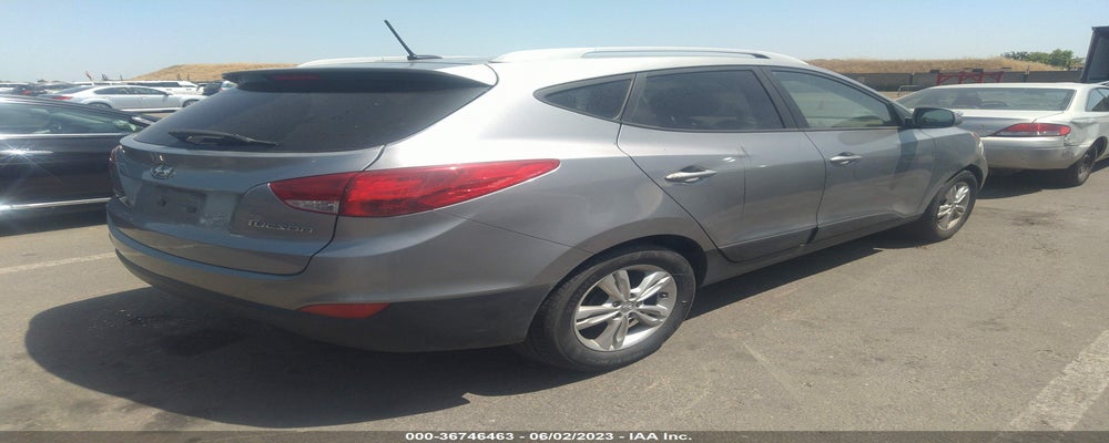 KM8JU3AC4DU556874 2013 HYUNDAI TUCSON photo no. 4