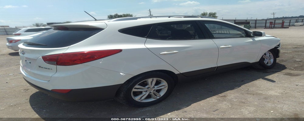 KM8JU3AC5AU095857 2010 HYUNDAI TUCSON photo no. 4