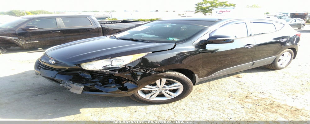 KM8JUCAC2CU423819 2012 HYUNDAI TUCSON photo no. 2