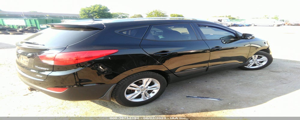 KM8JUCAC2CU423819 2012 HYUNDAI TUCSON photo no. 4