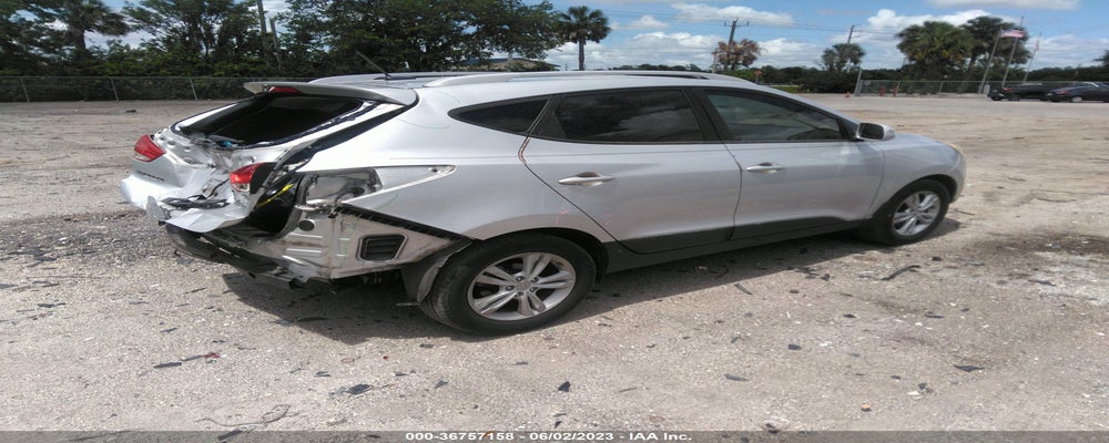 KM8JU3AC5DU591603 2013 HYUNDAI TUCSON photo no. 4